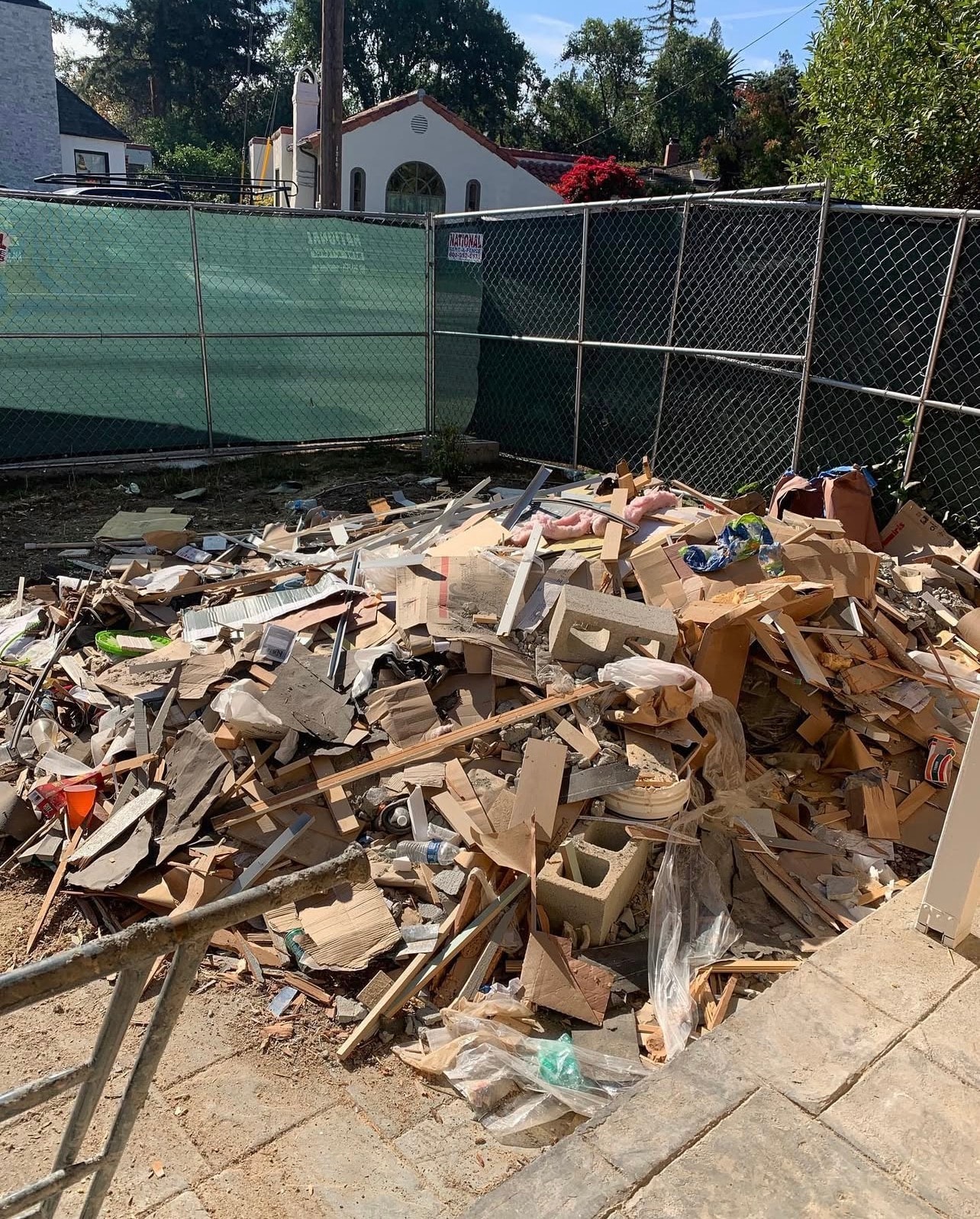 A residential yard before junk removal